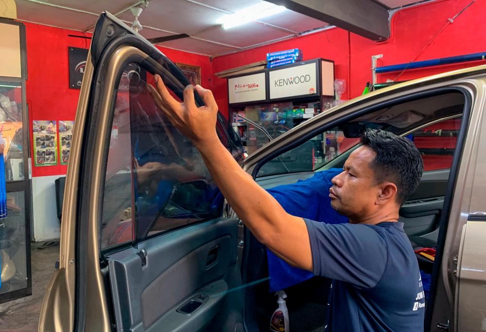 Hot weather blessing in disguise for vehicle tint operators