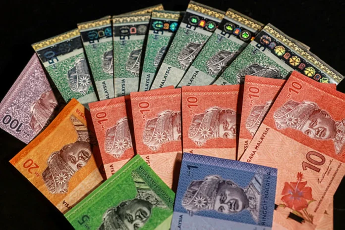 RINGGIT OPENS HIGHER AGAINST US DOLLAR AMID MIXED FED RATE VIEWS