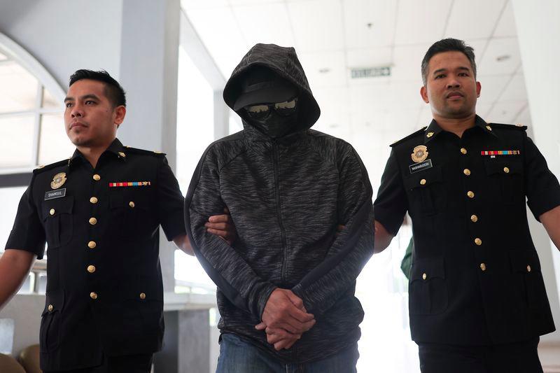 Immigration officer claims trial to 10 charges of receiving bribe Immigration officer claims trial to 10 charges of receiving bribe