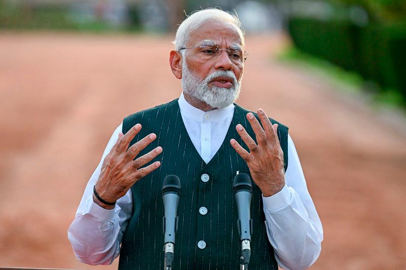 India’s Modi formally stakes claim to form new government