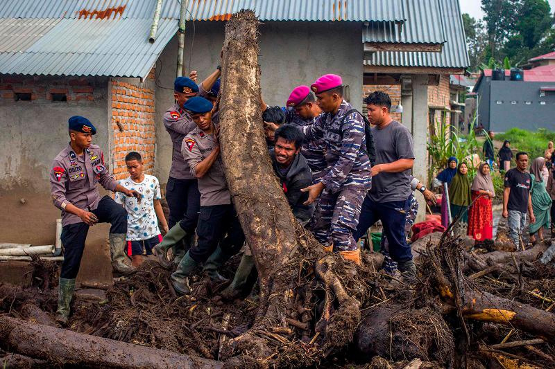 Indonesia floods kill 67 as rescuers race to find missing