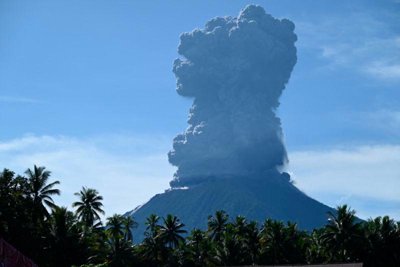 Indonesia's Mount Ibu erupts again, spews huge ash tower Indonesia's Mount Ibu erupts again, spews huge ash tower