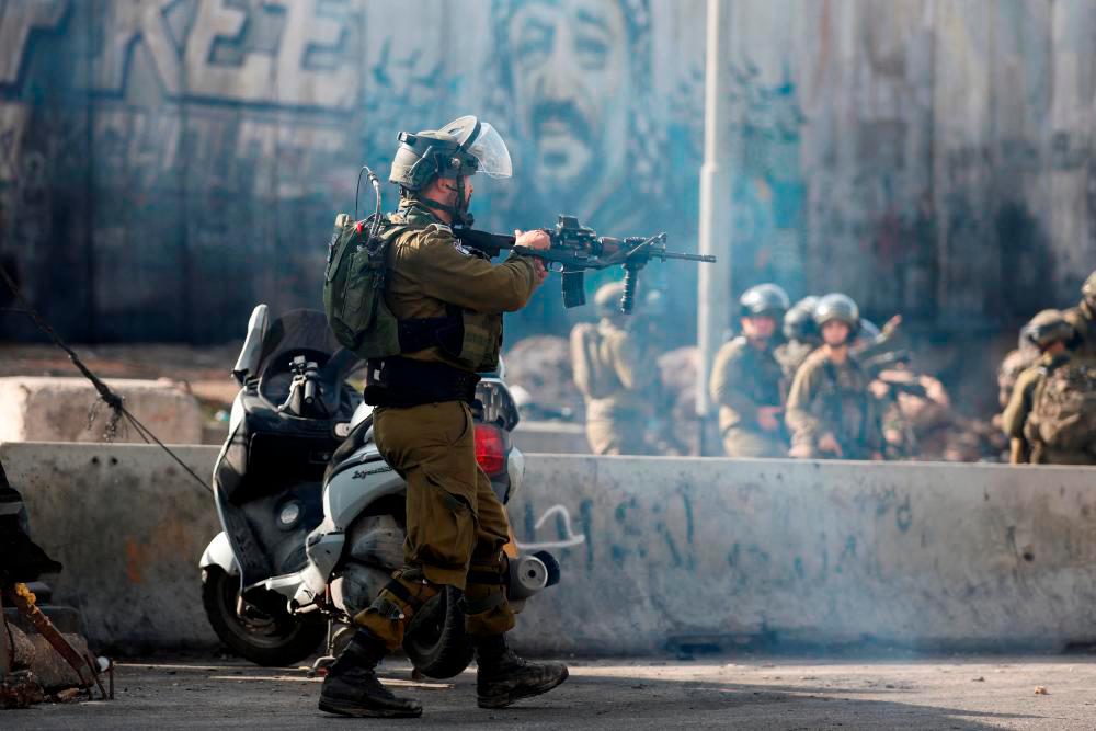 Israel hands over bodies of 3 Palestinians killed in March Israel hands over bodies of 3 Palestinians killed in March