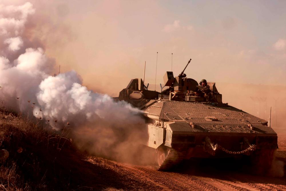 Israel readies to invade Gaza where one million have fled homes