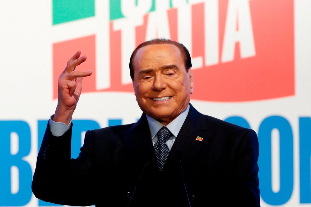 Italy’s Berlusconi addresses party faithful from hospital