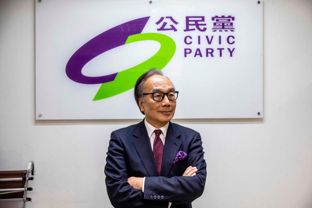 Jailed, unseated, exiled: Hong Kong opposition party shuts its doors