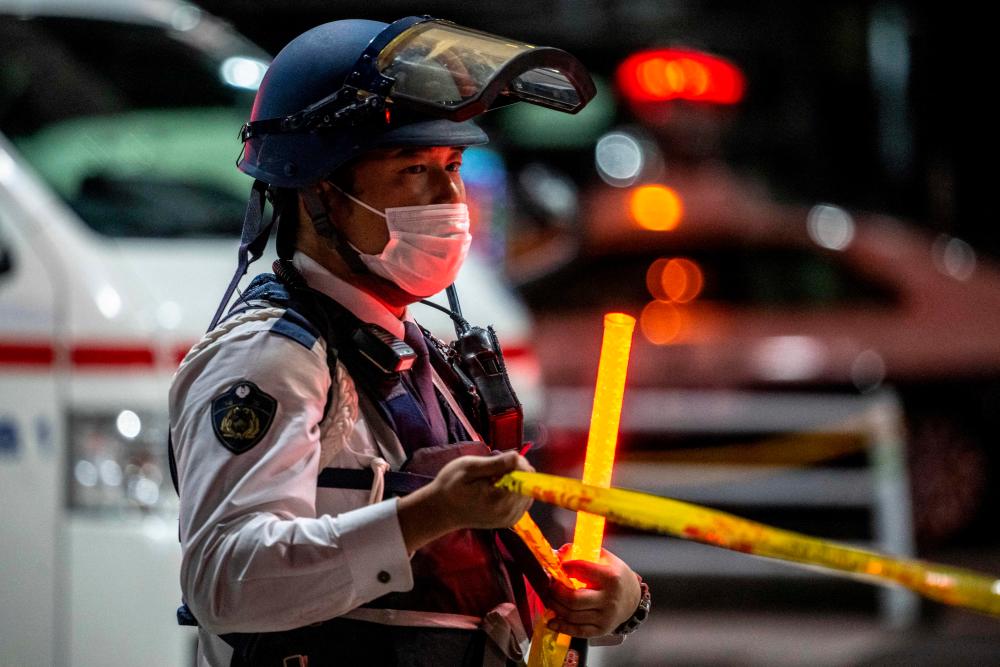 Japan police detain hostage-taker after hours-long standoff