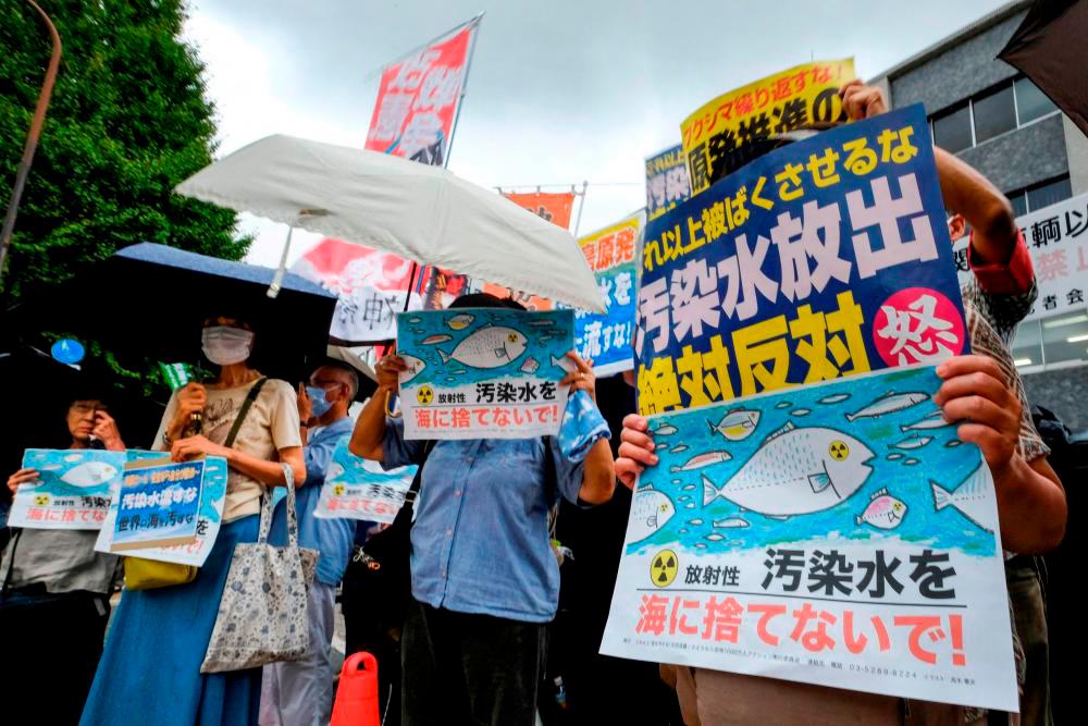 Japan's fishermen, locals file suit to stop Fukushima water release