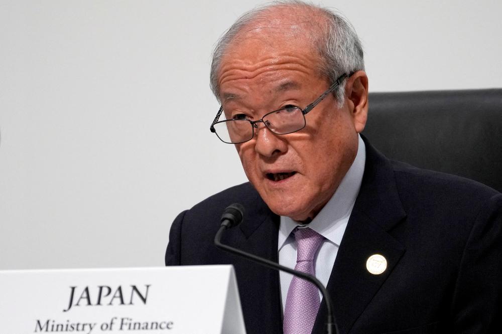 Japan’s finance minister warns again of steps to deal with Yen’s decline Japan’s finance minister warns again of steps to deal with Yen’s decline