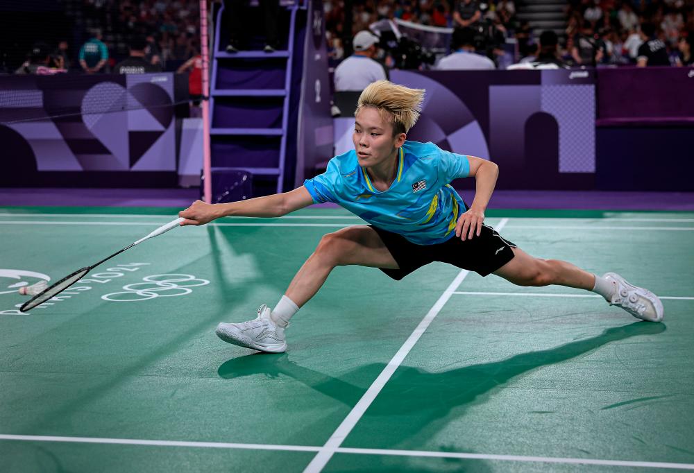 Jin Wei crashes out of Malaysian Open after stomach cramp setback Jin Wei crashes out of Malaysian Open after stomach cramp setback