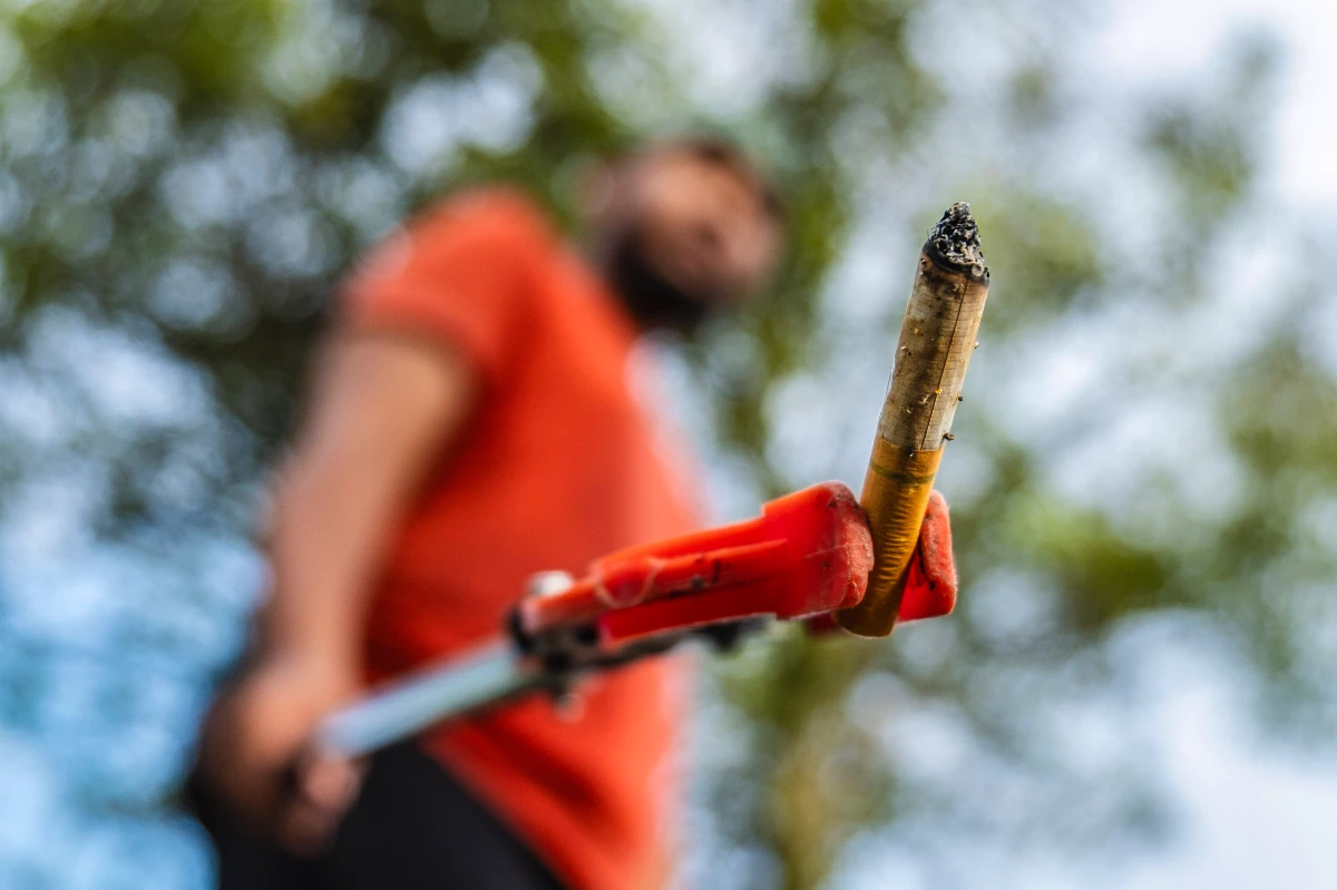 Caught tossing cigarette butts, 20-year-old learns hard lesson