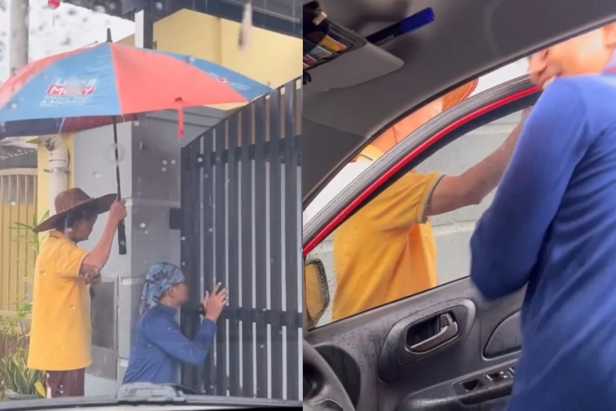 Kind_Chinese_auntie_shields_courier_from_rain_during_delivery