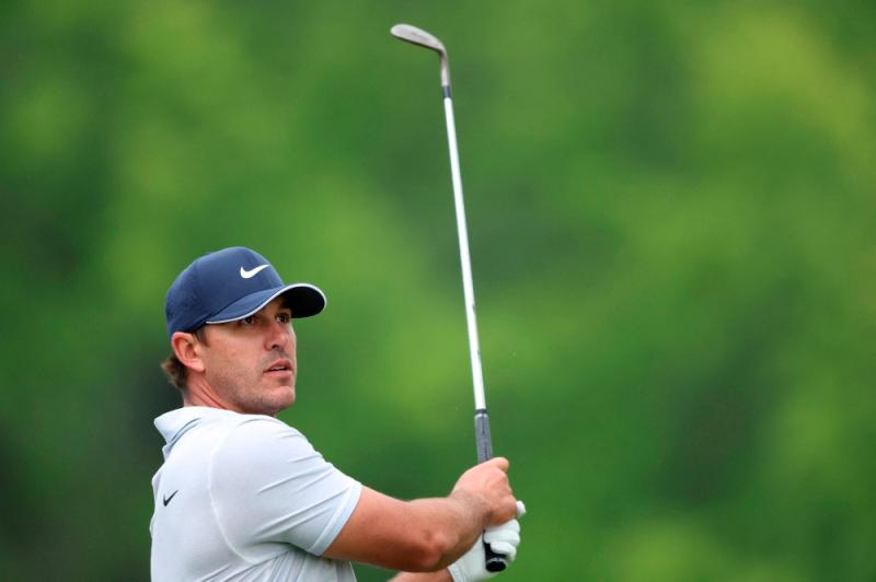 Koepka turns boos to roars in grabbing PGA lead at rainy Oak Hill Koepka turns boos to roars in grabbing PGA lead at rainy Oak Hill