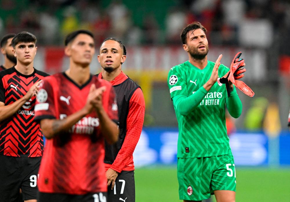 Leaders Milan face title rivals Juve as betting scandal rocks Italy