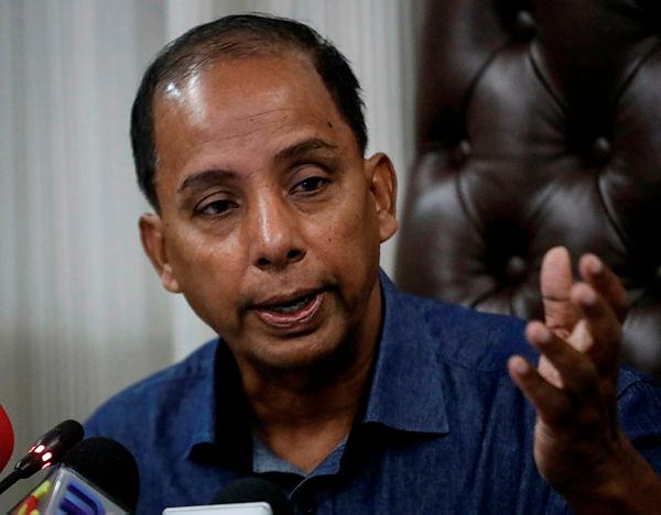 MPs urge HR ministry to take action against Chinese Muslim eatery for terminating employee for wearing a cross