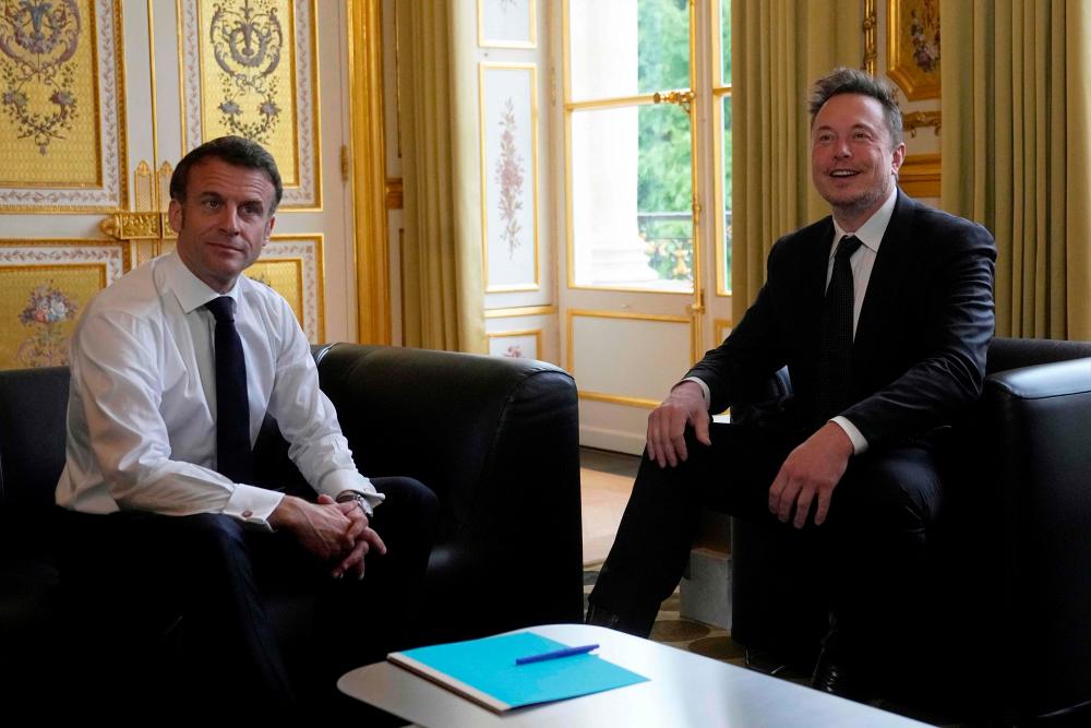 Macron, Musk meet in Paris on investing in France