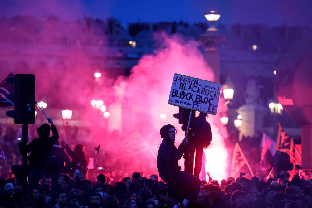 Macron faces further fury after pushing through France pension law