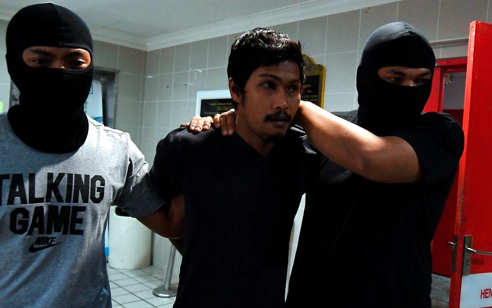 Man charged with eight counts of terrorism-related offences ordered to enter defence Man charged with eight counts of terrorism-related offences ordered to enter defence