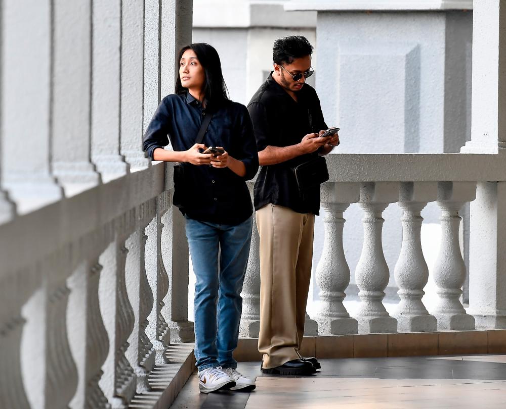 Man, two female companions charged with selling pornographic video recordings