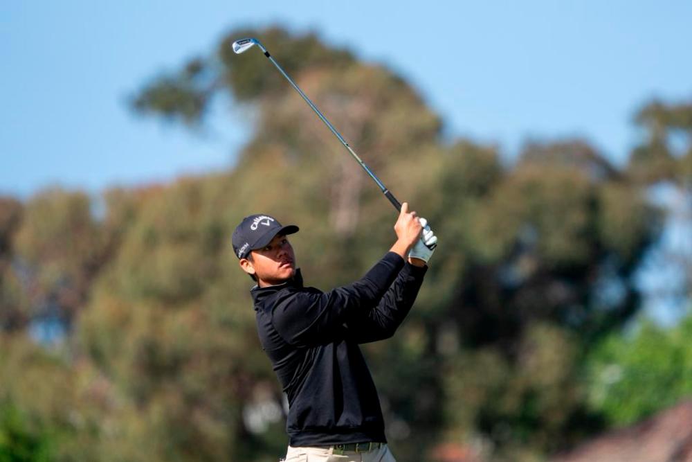 Marcus Lim heads into Asia-Pacific Amateur Championship weekend three shots off the pace, one of four Malaysians to make the cut