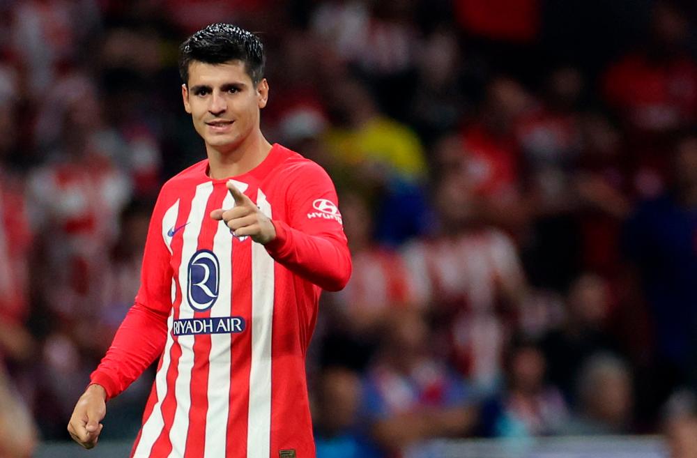 Morata brace helps Atletico end Real Madrid winning streak Morata brace helps Atletico end Real Madrid winning streak