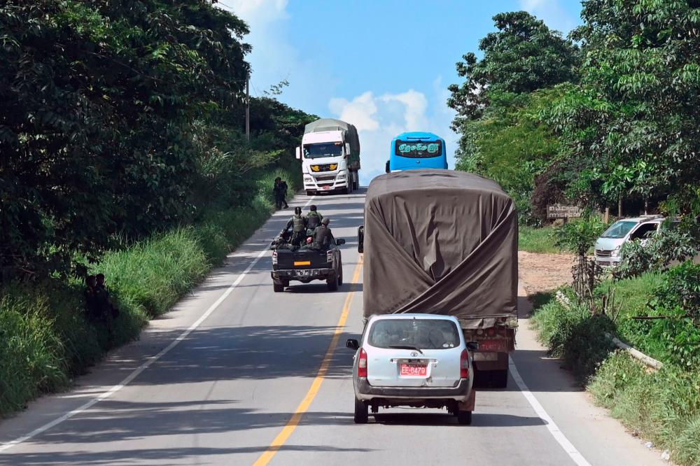 Myanmar truckers slog on as conflict clogs trade highway