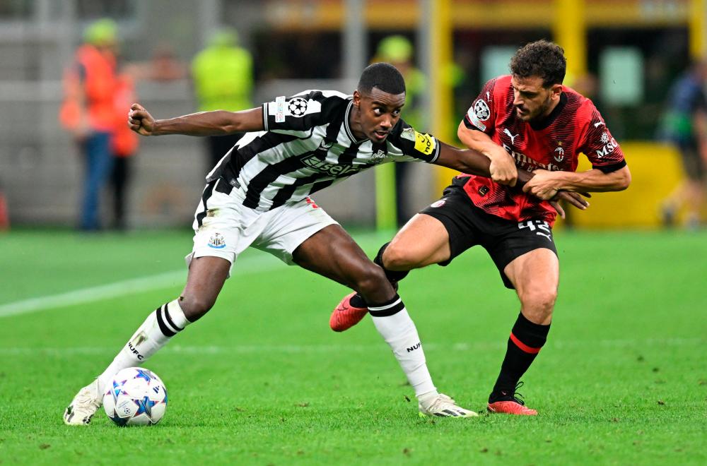 Newcastle hold AC Milan on Champions League return Newcastle hold AC Milan on Champions League return