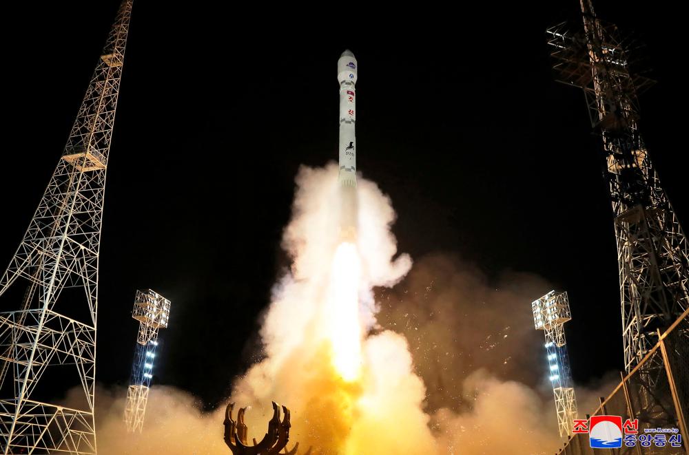 North Korea says it successfully launched spy satellite North Korea says it successfully launched spy satellite