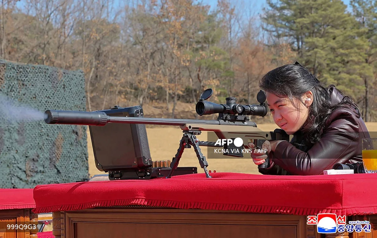 North_Korea_unveils_image_of_leader_s_daughter_firing_rifle North Korea unveils image of leader's daughter firing rifle