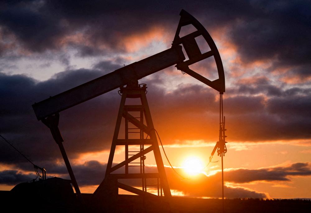 Oil gains 3% on IEA demand upgrade, weaker dollar Oil gains 3% on IEA demand upgrade, weaker dollar