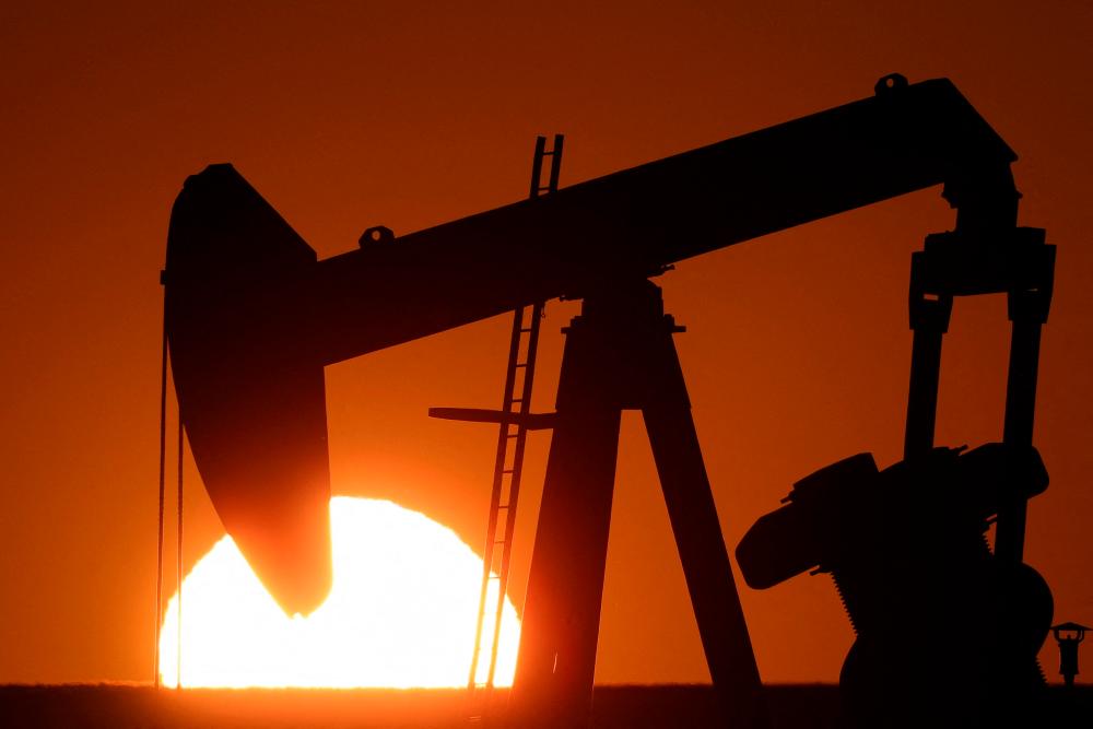 Oil steady, signs Middle East tensions easing offset higher demand outlook