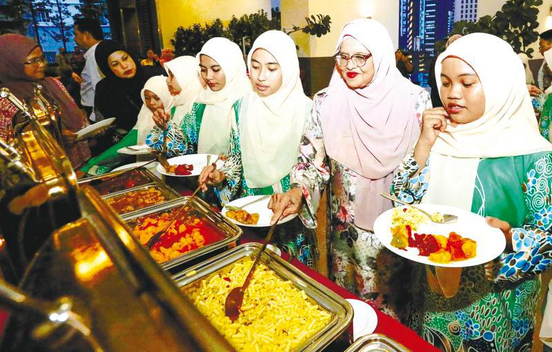 Orphans, caregivers treated to Ramadan dinner