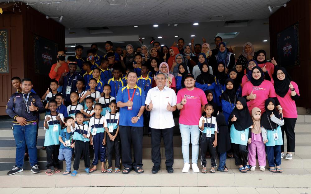 PKNS brings early Raya cheer to PEKEAS orphans