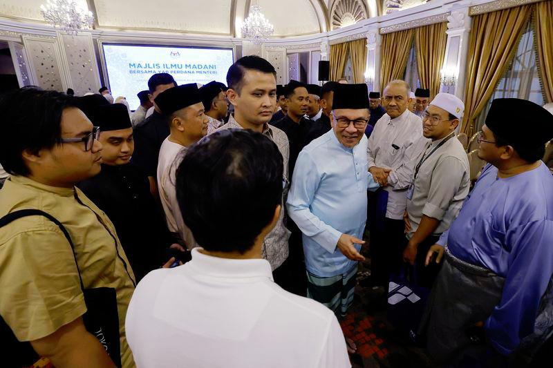 PM launches Malay translation of ‘Kitab Fiqh’ PM launches Malay translation of ‘Kitab Fiqh’