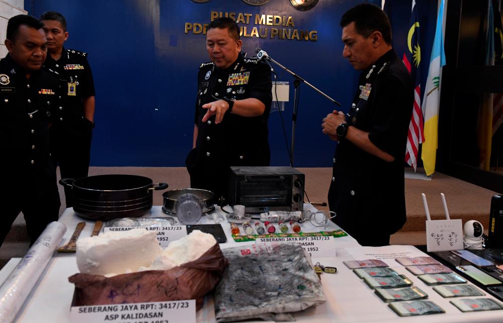 Penang police detain man with 7,400 grams of heroine Penang police detain man with 7,400 grams of heroine