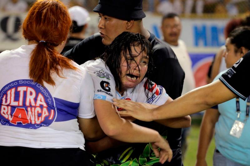 Police: Nine dead in El Salvador stadium stampede at football match Police: Nine dead in El Salvador stadium stampede at football match