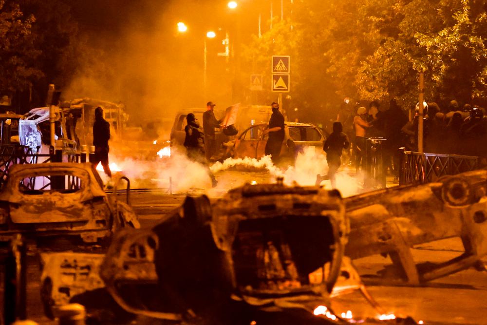 Police brace for more violent protests over French teen's killing