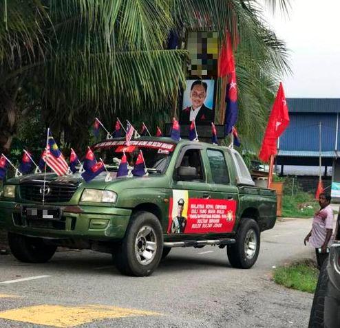 Police detain two men for using pictures of Agong during by-election campaign Police detain two men for using pictures of Agong during by-election campaign