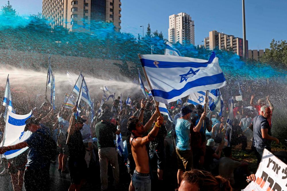 Protests erupt in Israel after approval of law to limit Supreme Court’s power Protests erupt in Israel after approval of law to limit Supreme Court’s power