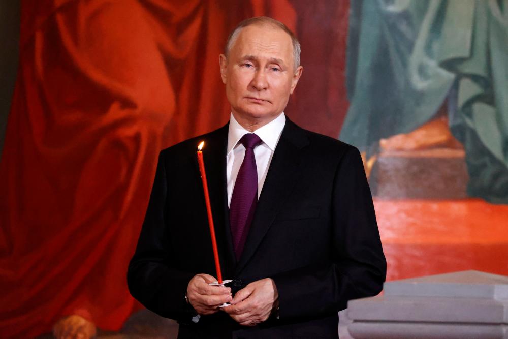 Putin applauds ‘strengthening’ role of church amid conflict
