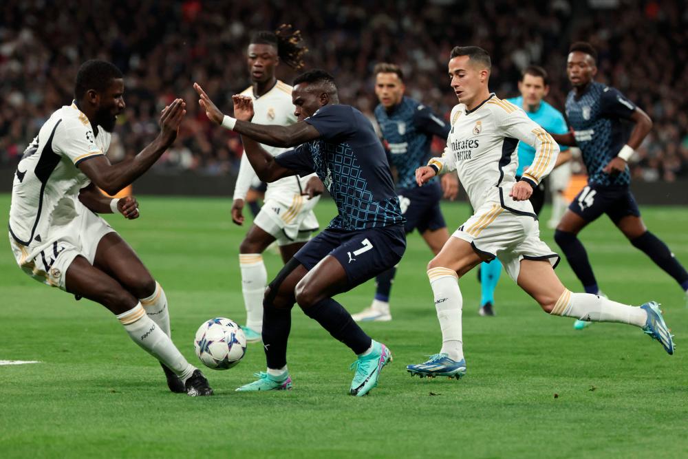 Real Madrid ease past Braga to reach Champions League last 16
