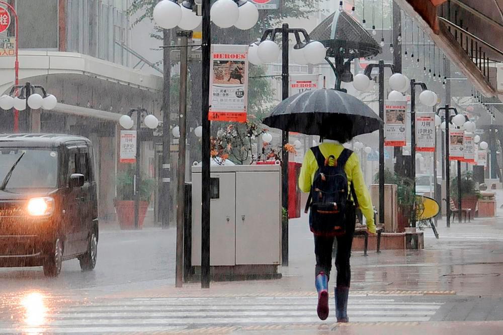 Record rain in parts of Japan after tropical storm