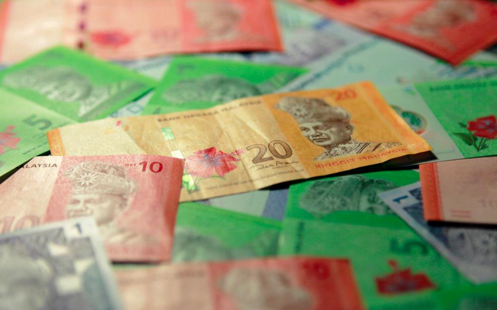 Ringgit opens higher against US dollar as greenback weakens