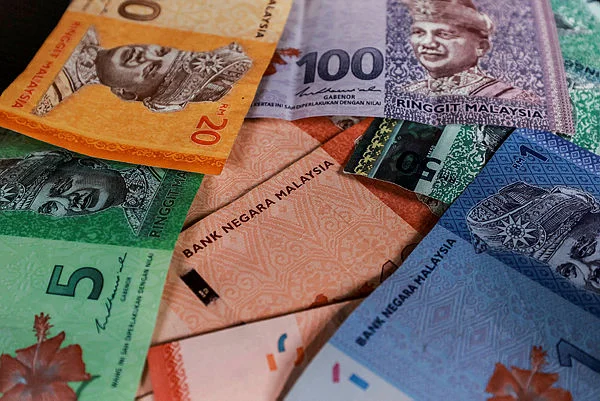 Ringgit gains against US dollar on softer greenback