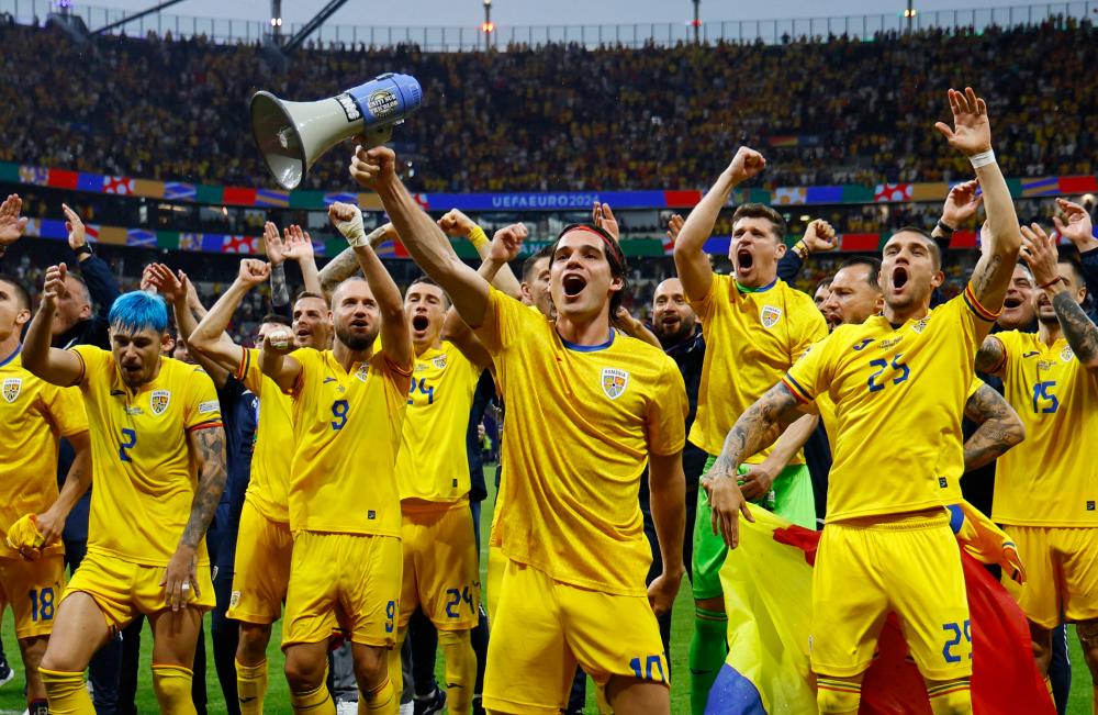 Romania and Slovakia reach last 16 at Euro 2024 after tense draw