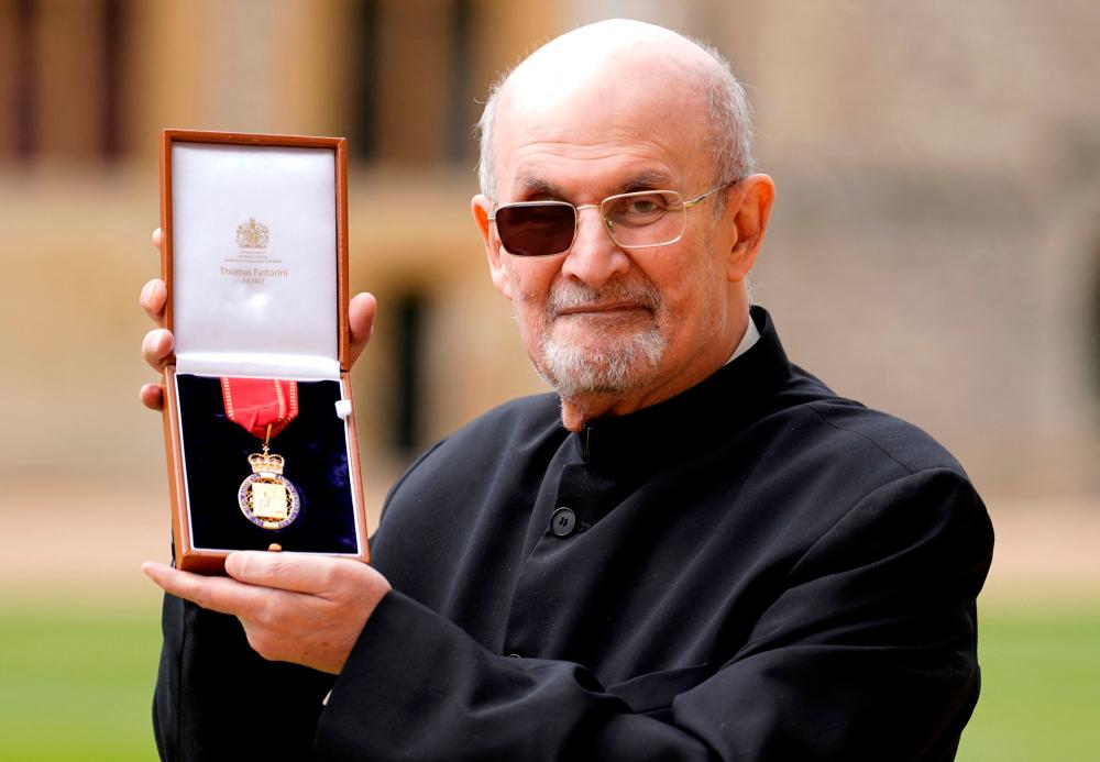 Rushdie says writing again after near-fatal attack