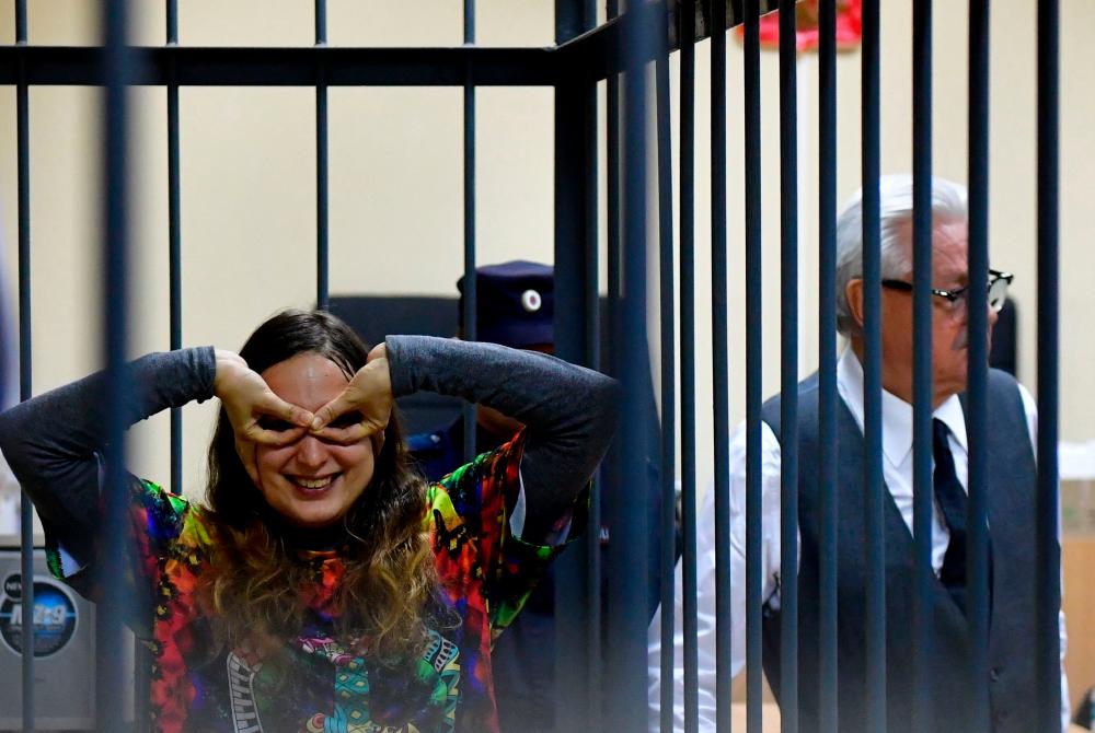Russian artist who staged anti-war protest in supermarket jailed for seven years Russian artist who staged anti-war protest in supermarket jailed for seven years