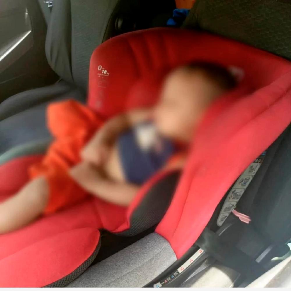 Sabah firemen rescue nine-month-old baby from locked car Sabah firemen rescue nine-month-old baby from locked car