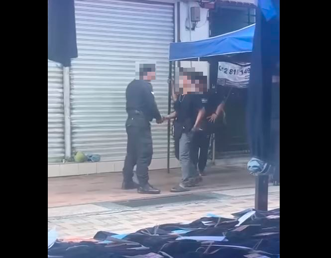 Sandakan IPD: Video of cop receiving something in suspicious manner being probed