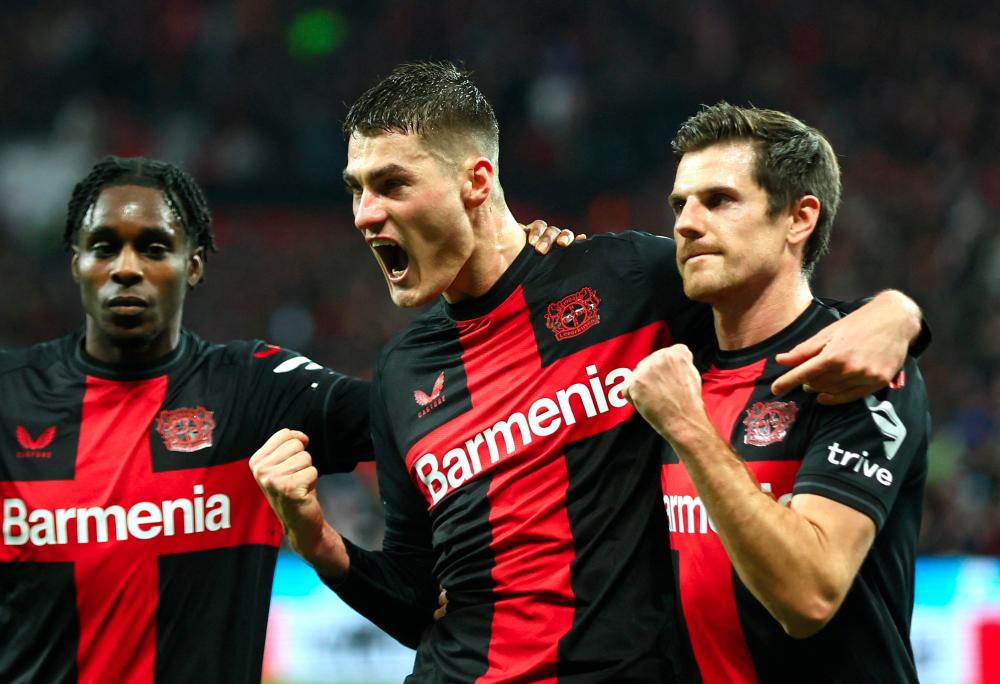 Schick hits hat-trick as Leverkusen beat Bochum, Kane scores in Bayern win Schick hits hat-trick as Leverkusen beat Bochum, Kane scores in Bayern win